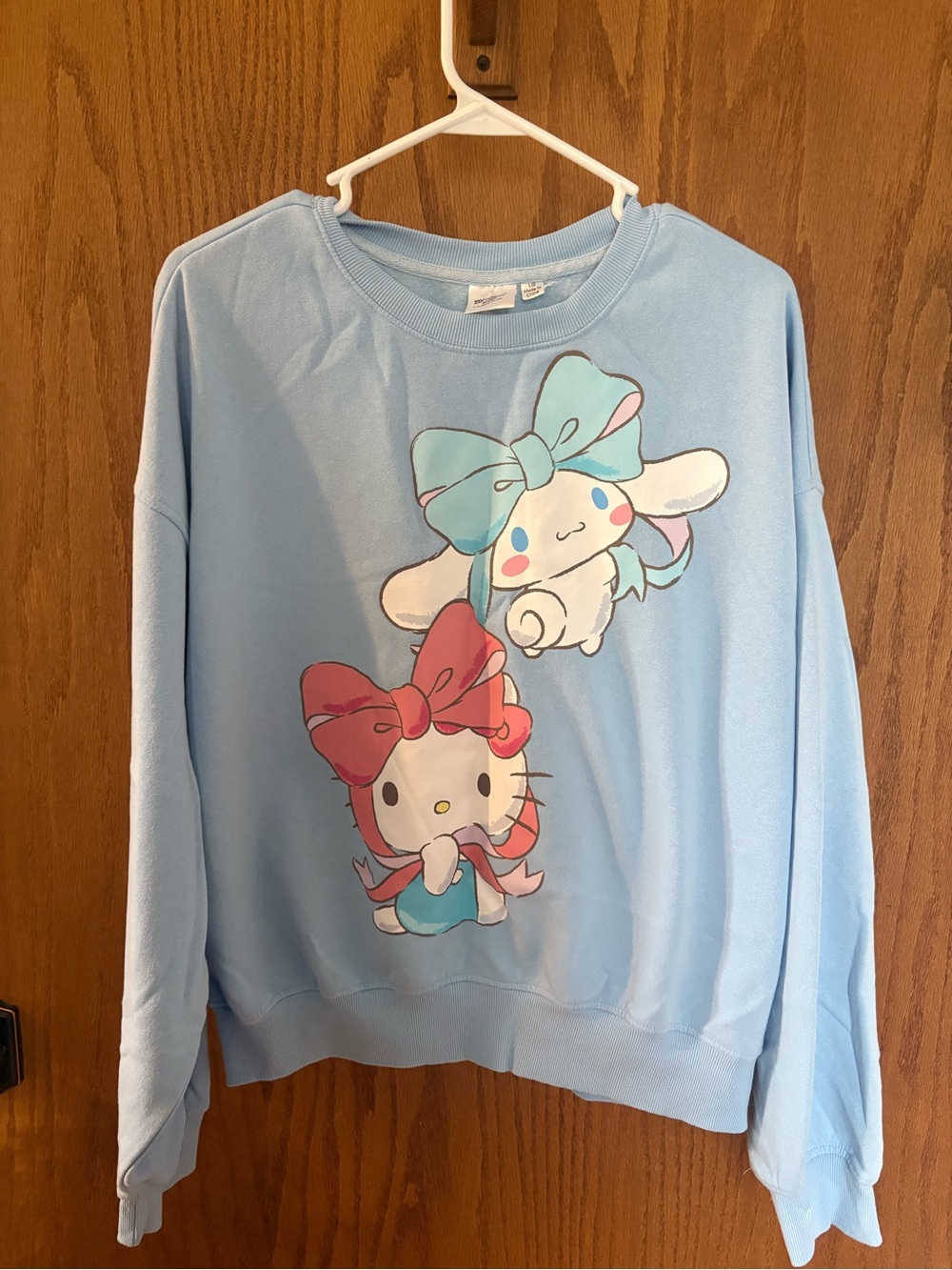 Hello Kitty Light Blue Crewneck Sweatshirt with Pink & Aqua Bows